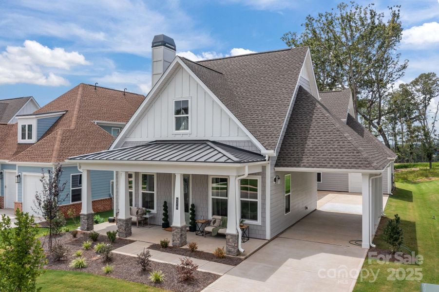 Front exterior of a new home in Lakeside Pointe, Sherrills Ford, NC, highlighting curb appeal (Image 1).