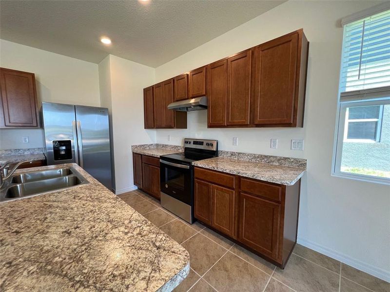 Furnished interior view inside a new home in , Davenport (Image 5).