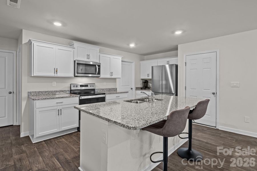 Furnished interior view inside a new home in Mills at Long Creek, Dallas (Image 13).