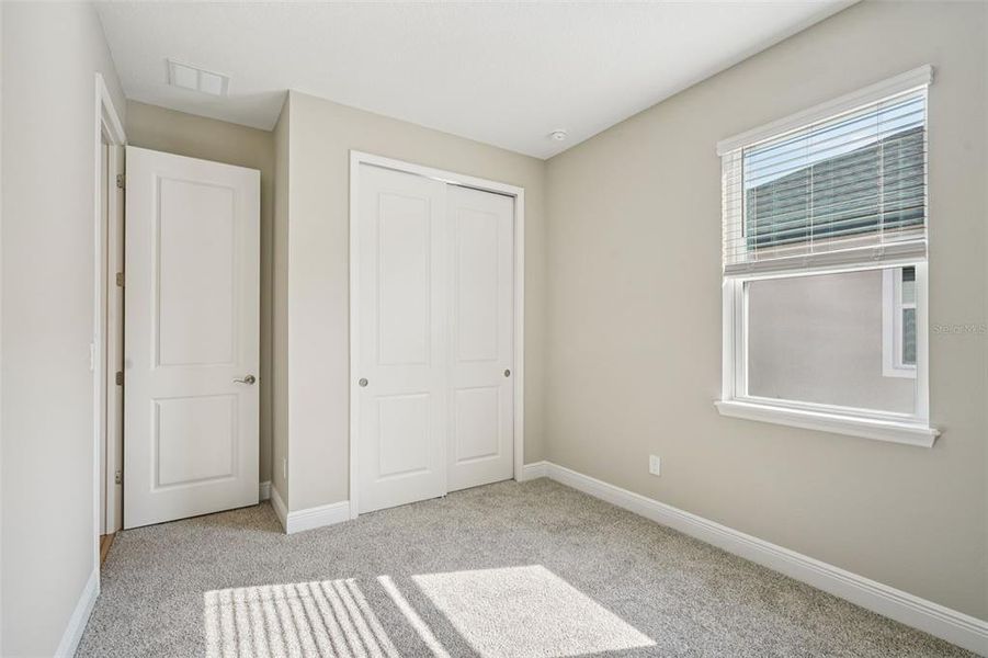 Spacious, unfurnished interior of a new home in Legends Preserve - Signature Series, Daytona Beach (Image 13). Spacious, unfurnished interior of a new home in Legends Preserve - Signature Series, Daytona Beach (Image 13).