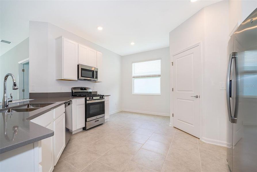 Furnished interior view inside a new home in Windsong: Estate Collection, Leesburg (Image 6).