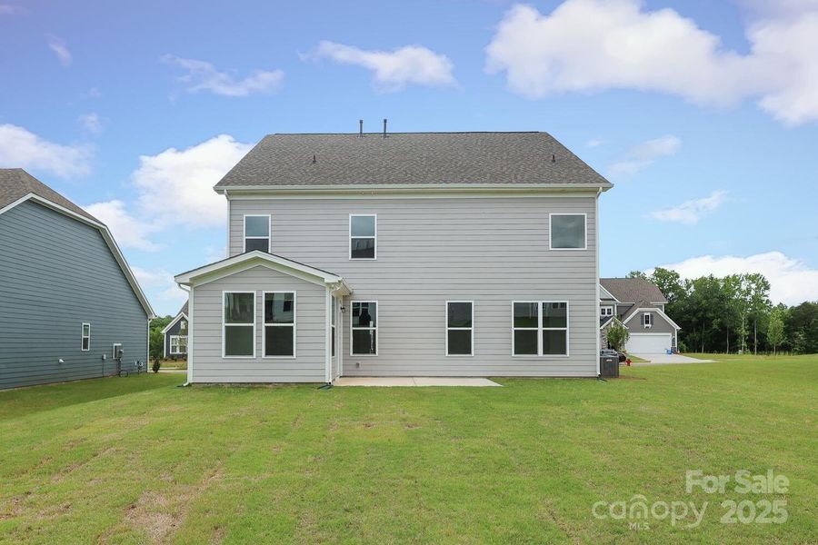 Front exterior of a new home in Estates at Sugar Creek, Indian Land, SC, highlighting curb appeal (Image 21).