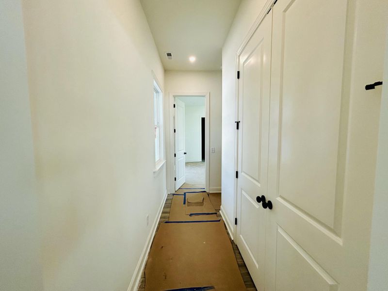 Spacious, unfurnished interior of a new home in The Domus Collection at Midtown Nexton, Summerville (Image 44).