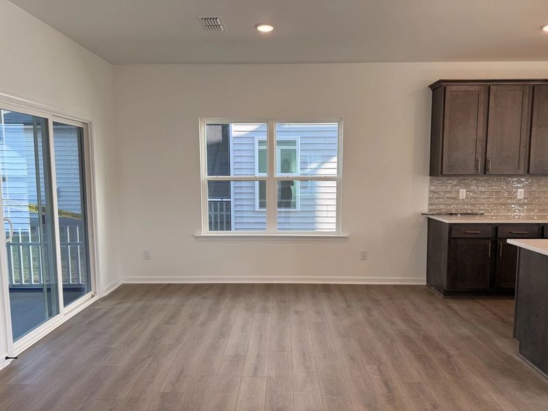 Breakfast Area featuring AW Collection® Oxford - Sunlit comfort to start the day.