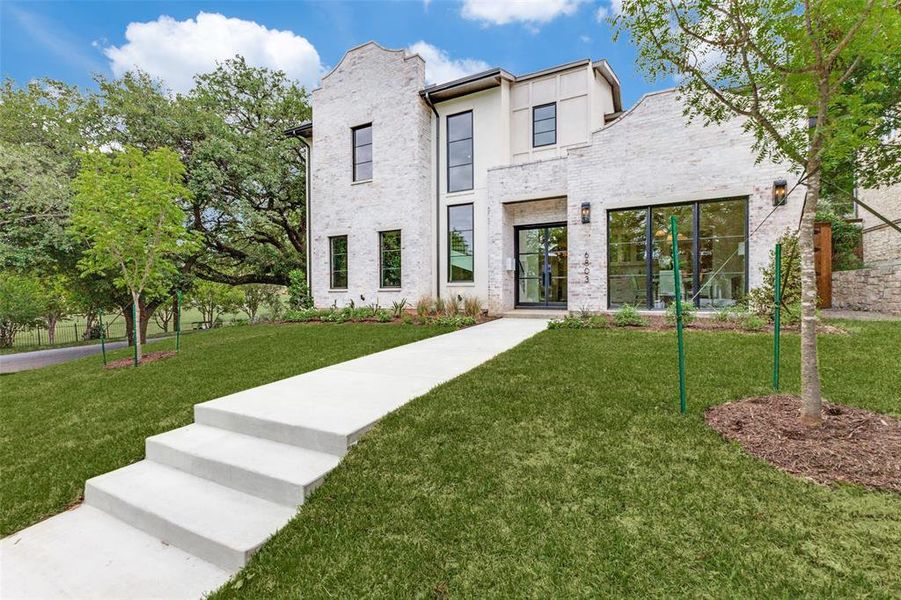 Front exterior of a new home in , Dallas, TX, highlighting curb appeal (Image 1). Front exterior of a new home in , Dallas, TX, highlighting curb appeal (Image 1).