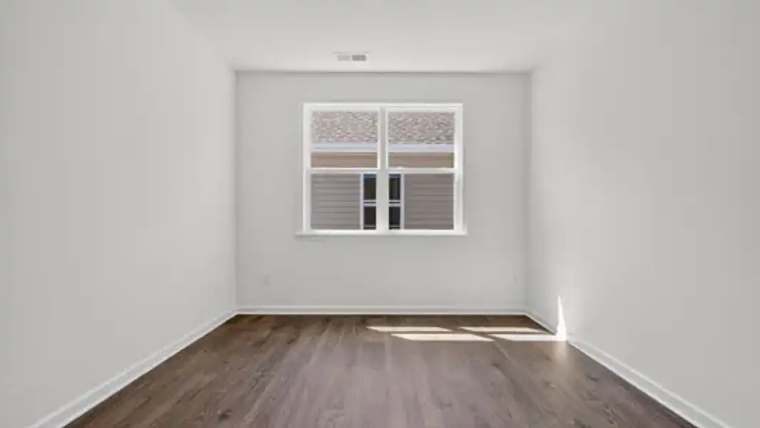 Spacious, unfurnished interior of a new home in The Villas at Galvins Ridge, Sanford (Image 15).