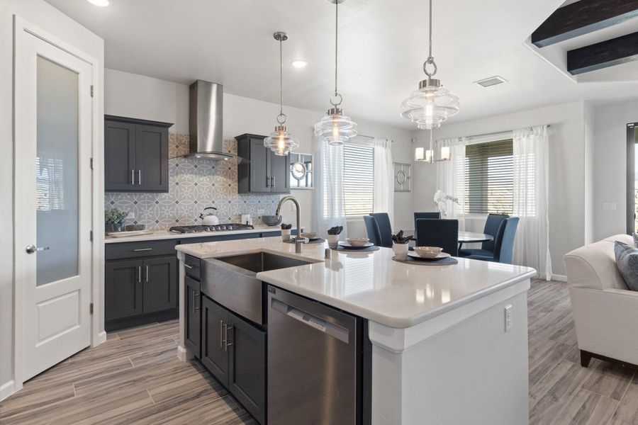 Representative furnished interior of a home built from the Valencia by Hakes Brothers in Hillside Park, El Paso (Image 9).