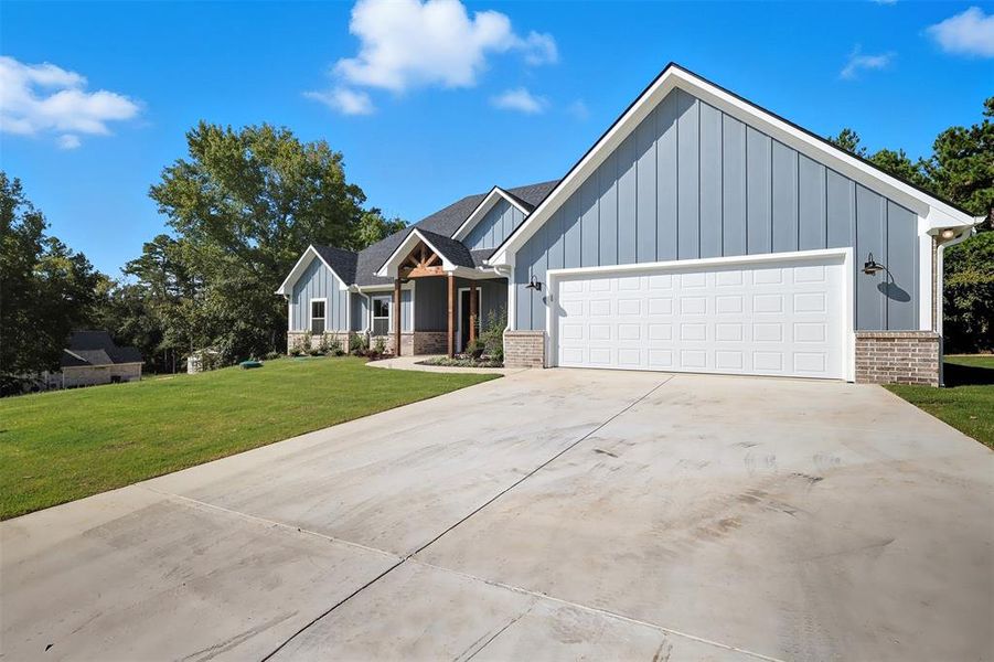 Front exterior of a new home in , Lindale, TX, highlighting curb appeal (Image 2). Front exterior of a new home in , Lindale, TX, highlighting curb appeal (Image 2).