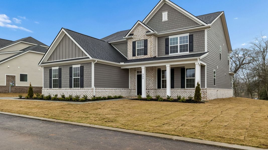 Front exterior of a new home in Harvest Point, Spring Hill, TN, highlighting curb appeal (Image 27).