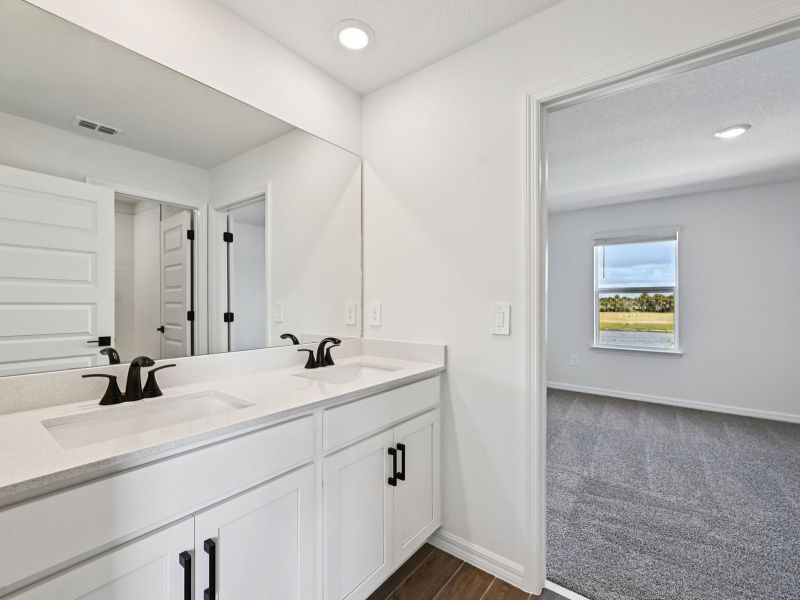 Furnished interior view inside a new home in Oakfield Trails - Signature Series, Parrish (Image 6).