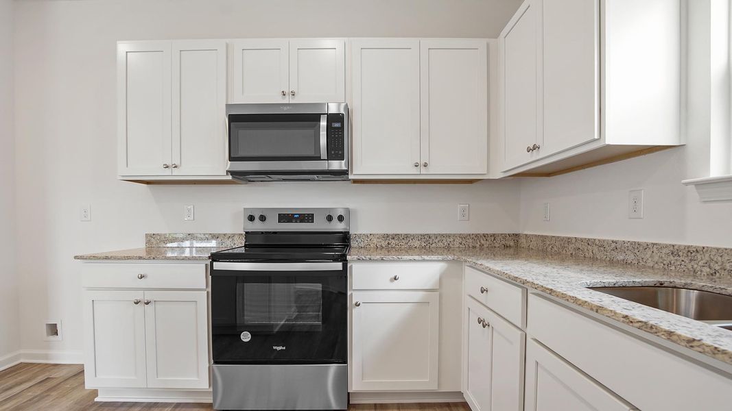 Representative furnished interior of a home built from the Cary by D.R. Horton in Owl's Head East, Freeport (Image 7). Representative furnished interior of a home built from the Cary by D.R. Horton in Owl's Head East, Freeport (Image 7).