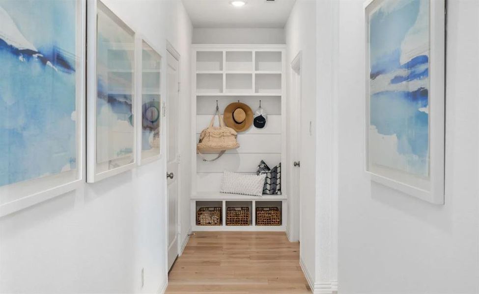 Mudroom featuring light hardwood / wood-style floors