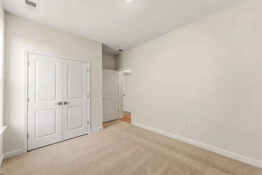 Spacious, unfurnished interior of a new home in Cottages at Lake Emory, Inman (Image 27).