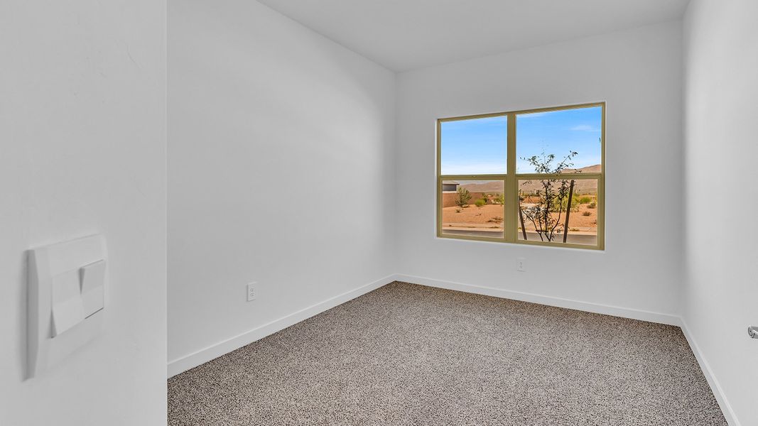 Representative unfurnished interior of a home built from the Parker by D.R. Horton in The Oasis at Rocking K, Vail (Image 17).