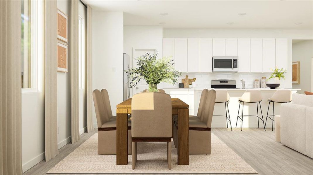 Dining room with light wood-type flooring