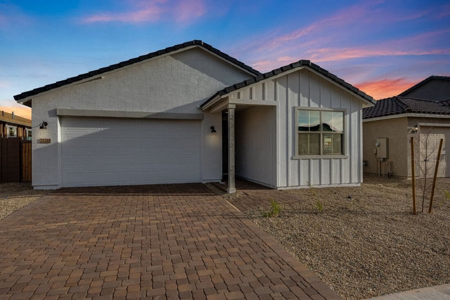 Representative exterior photo of a completed home built from the Sandstone by Taylor Morrison in Artisan at Asante Discovery Collection, Surprise, AZ (Image 19). Representative exterior photo of a completed home built from the Sandstone by Taylor Morrison in Artisan at Asante Discovery Collection, Surprise, AZ (Image 19).