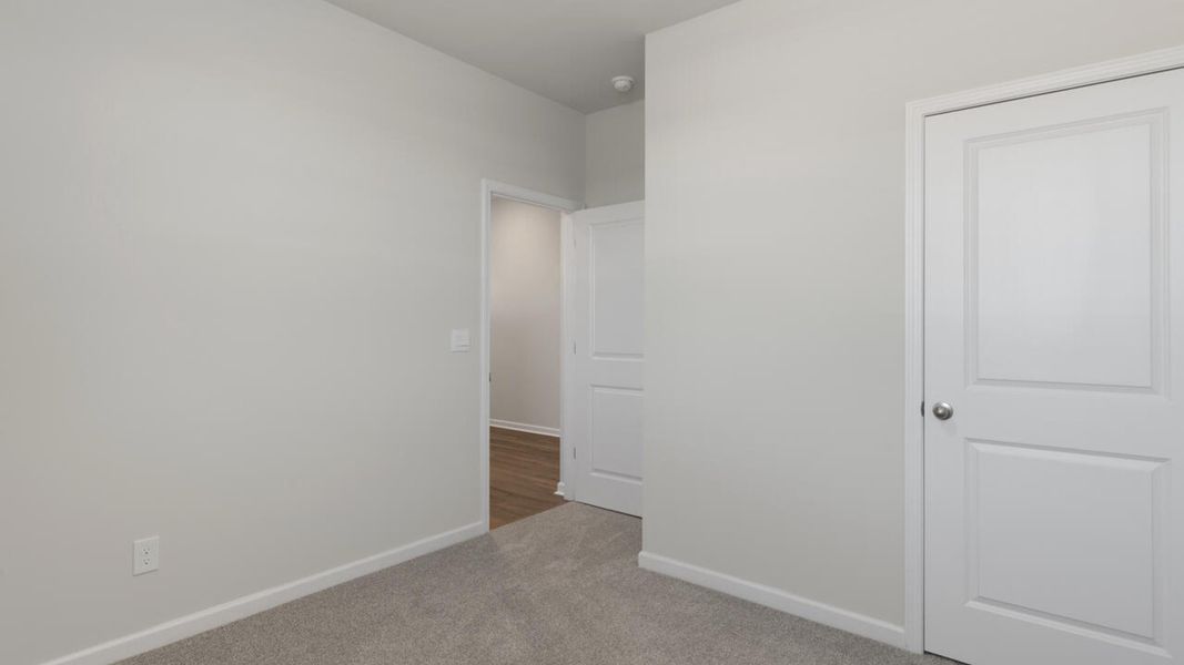 Spacious, unfurnished interior of a new home in The Grove at Blake Farm, Wilmington (Image 17).