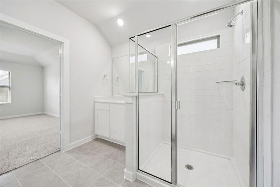 Primary Bathroom in the Heisman home plan by Trophy Signature Homes – REPRESENTATIVE PHOTO Primary Bathroom in the Heisman home plan by Trophy Signature Homes – REPRESENTATIVE PHOTO