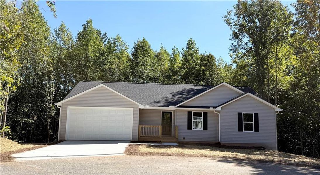 Front exterior of a new home in , Mount Airy, GA, highlighting curb appeal (Image 13).