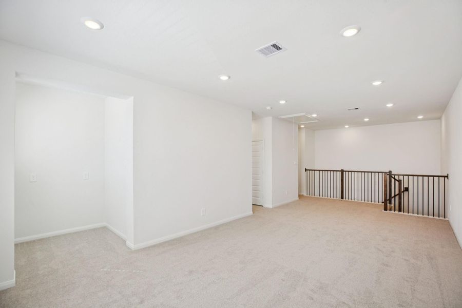 Spacious, unfurnished interior of a new home in Pinewood Trails - Luxe Series, Atascocita (Image 21).