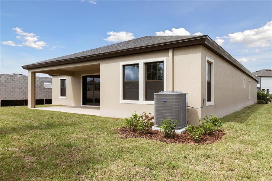 Exterior details and patio area of a home in Caldera, Spring Hill (Image 19).