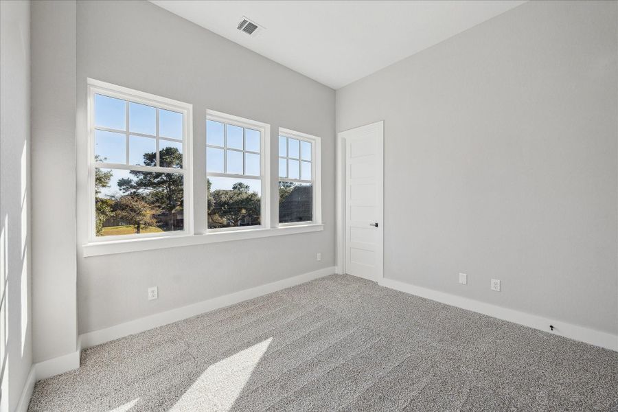 Upstairs Bedroom #2. All Bedrooms have large Walk In Closets