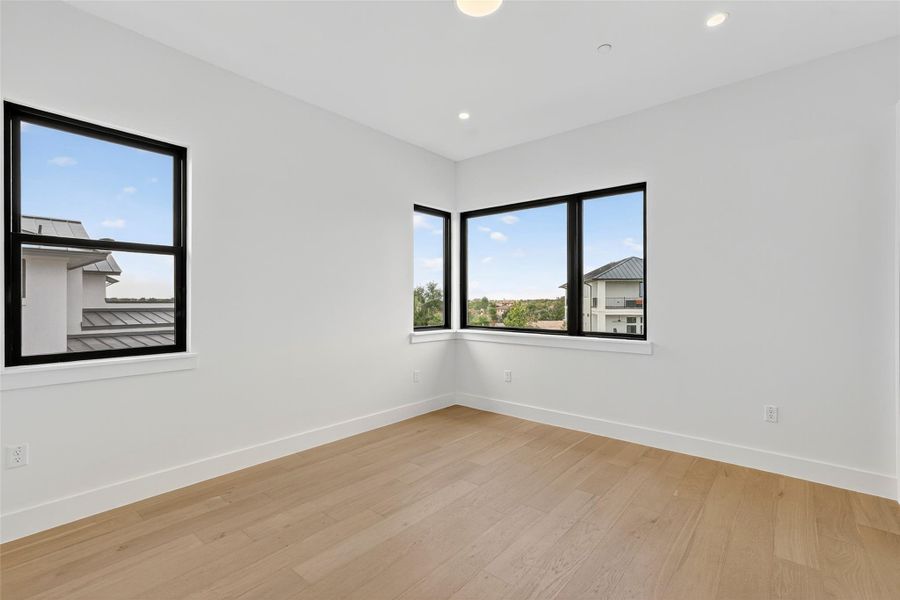 Spacious, unfurnished interior of a new home in Milky Way at River Place, Austin (Image 34).
