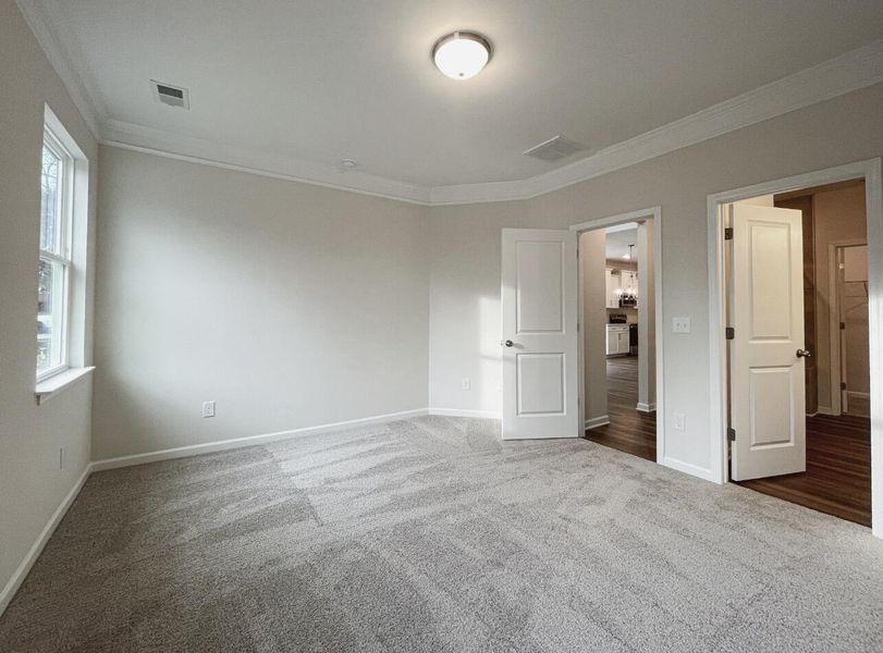 Spacious, unfurnished interior of a new home in East Main Townes, Spartanburg (Image 13).