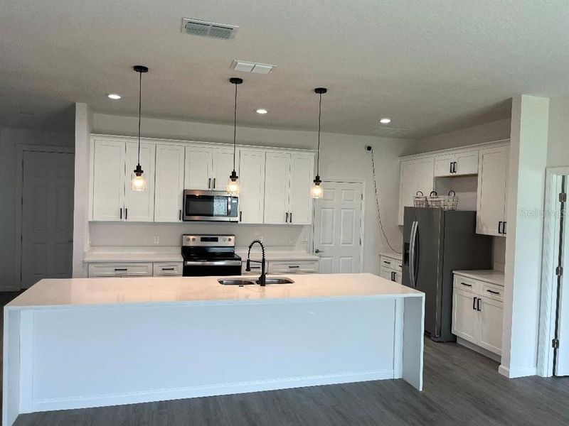 Furnished interior view inside a new home in , Kissimmee (Image 7). Furnished interior view inside a new home in , Kissimmee (Image 7).