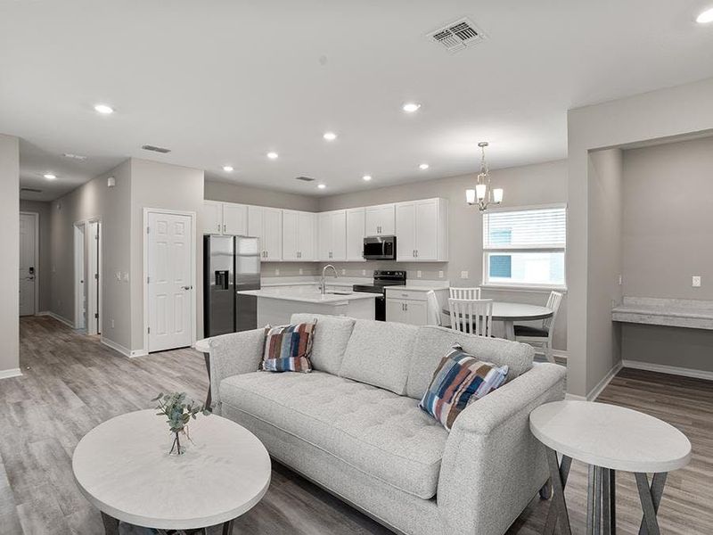 Enjoy a sunny, open living area - Donatella bungalow by Highland Homes