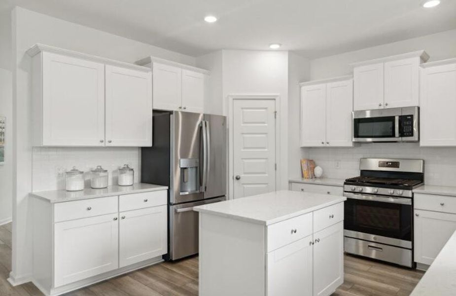 Furnished interior view inside a new home in Sweetgrass at Summers Corner, Summerville (Image 9).