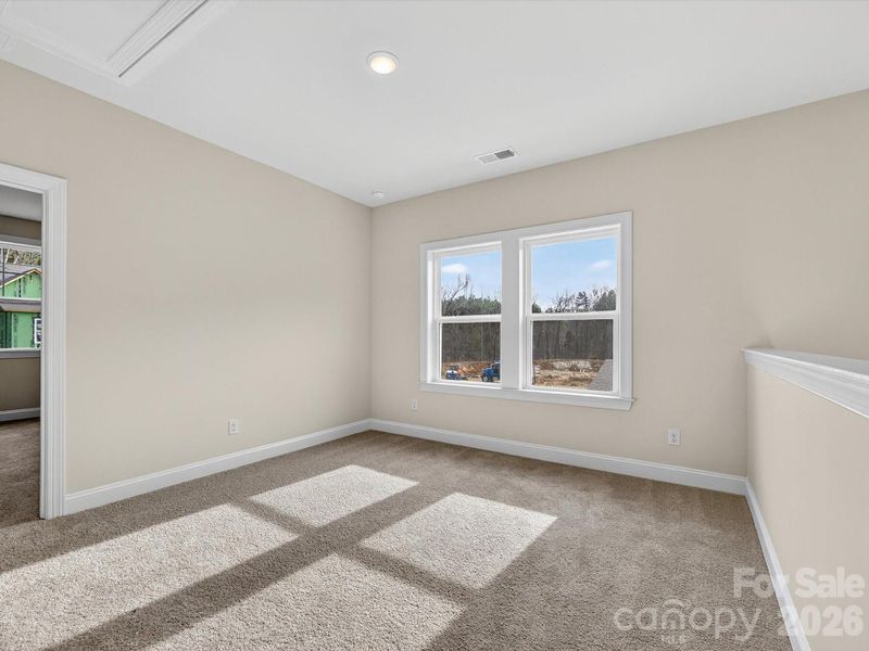 Spacious, unfurnished interior of a new home in North Creek Village, Huntersville (Image 30).