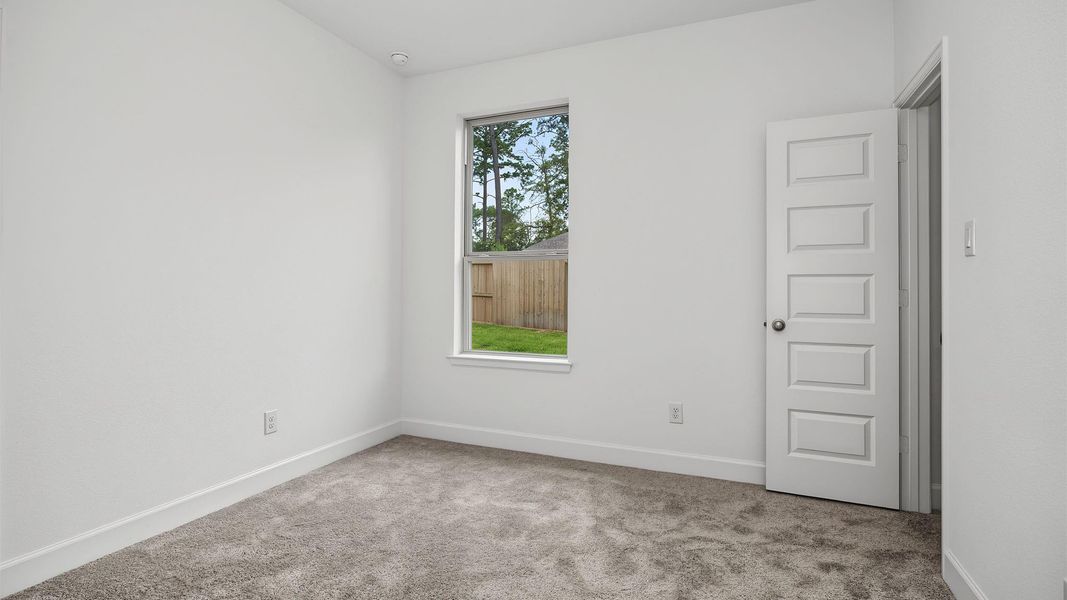 Spacious, unfurnished interior of a new home in The Woodlands Hills, Willis (Image 9).