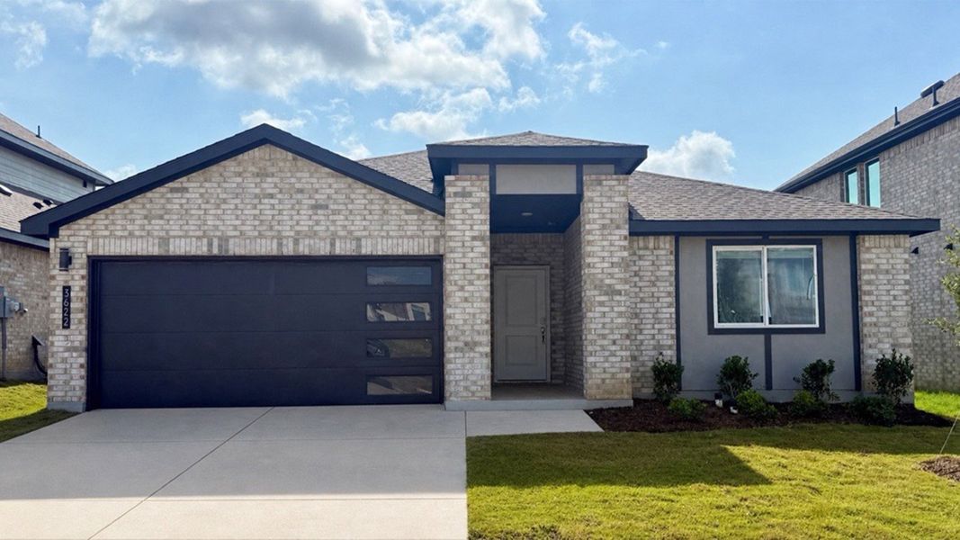 Representative exterior photo of a completed home built from the Zamboni by D.R. Horton in The Preserve at Forum, Grand Prairie, TX (Image 19).