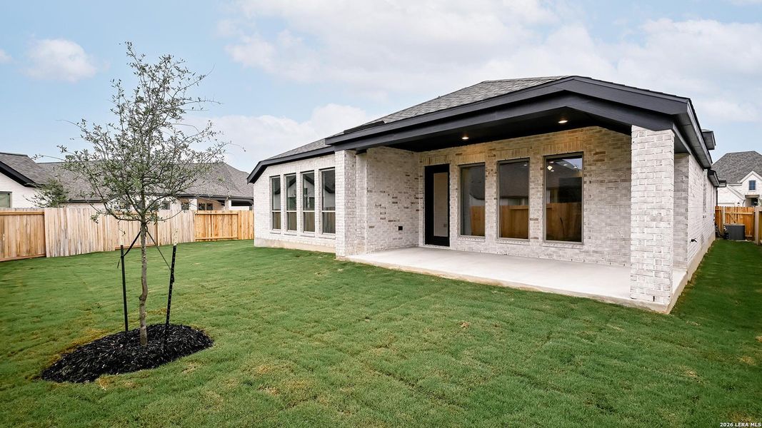 Exterior details and patio area of a home in Meadows of Mill Creek, Seguin (Image 18). Exterior details and patio area of a home in Meadows of Mill Creek, Seguin (Image 18).