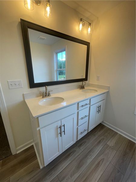 Furnished interior view inside a new home in Springwood Grove, Central (Image 8).