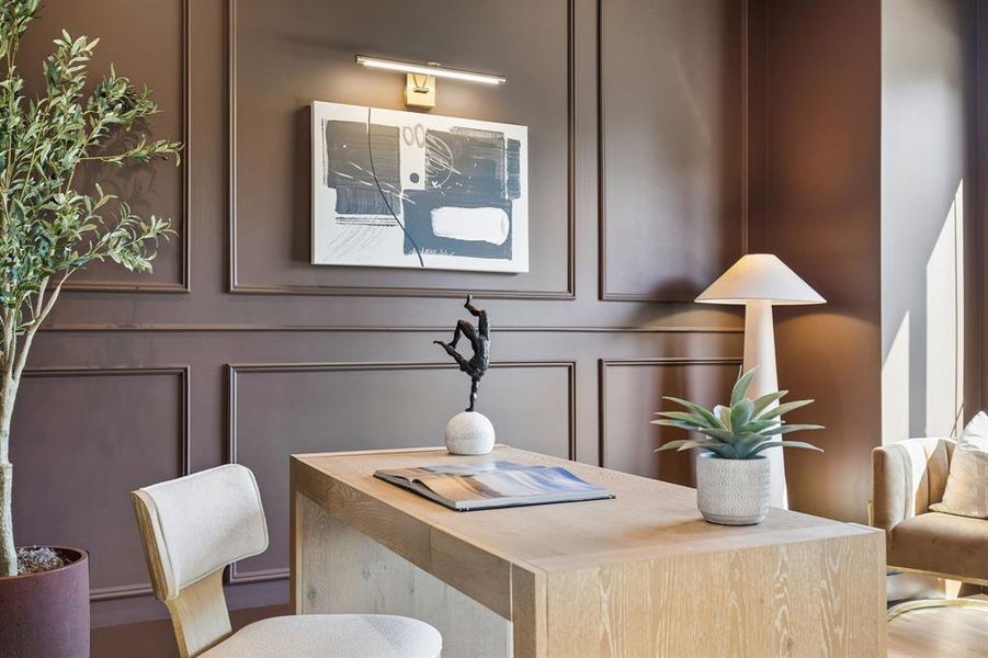 Office space featuring a decorative wall