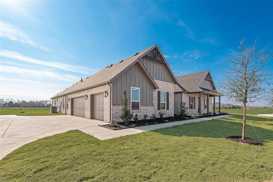 Front exterior of a new home in , Caddo Mills, TX, highlighting curb appeal (Image 24).