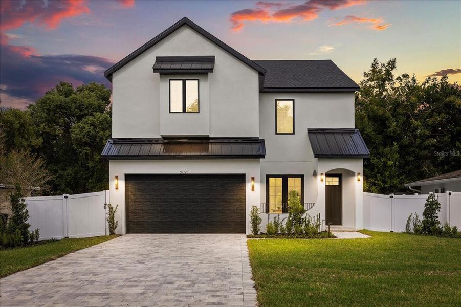 Front exterior of a new home in , Orlando, FL, highlighting curb appeal (Image 30). Front exterior of a new home in , Orlando, FL, highlighting curb appeal (Image 30).