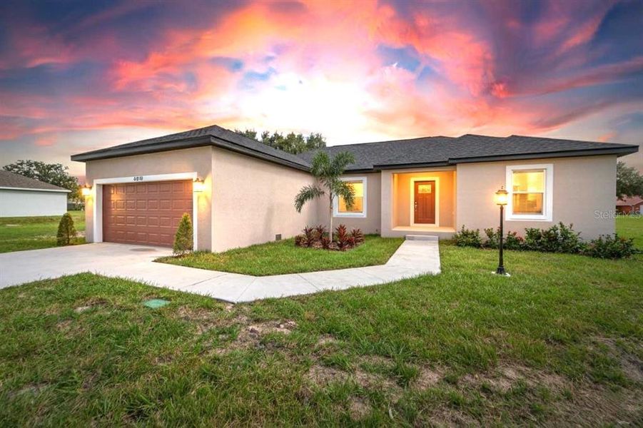 Front exterior of a new home in , Dade City, FL, highlighting curb appeal (Image 1). Front exterior of a new home in , Dade City, FL, highlighting curb appeal (Image 1).