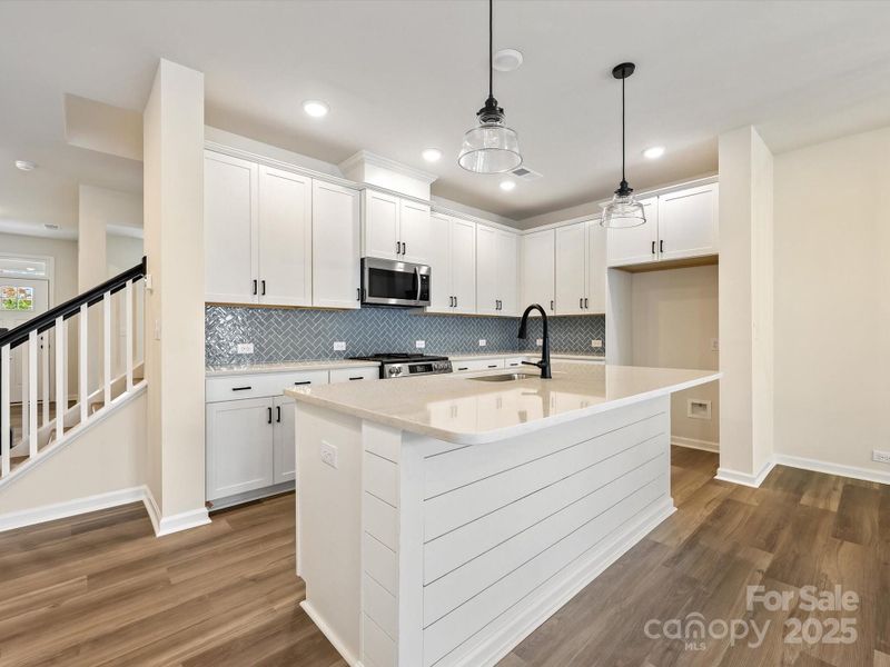 Furnished interior view inside a new home in North Creek Village - Townhomes, Huntersville (Image 5).