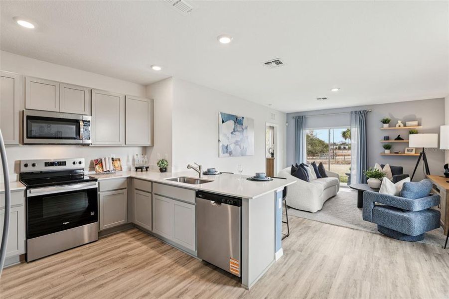 Furnished interior view inside a new home in , Winter Haven (Image 10). Furnished interior view inside a new home in , Winter Haven (Image 10).