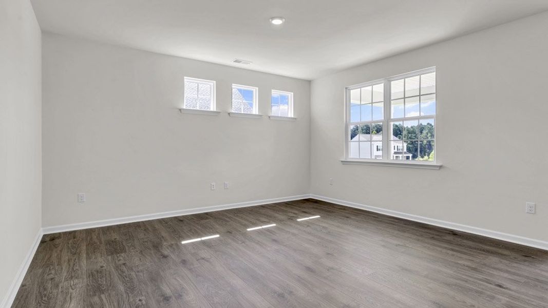 Representative unfurnished interior of a home built from the BRISTOL by D.R. Horton in The Villas at Galvins Ridge, Sanford (Image 12).