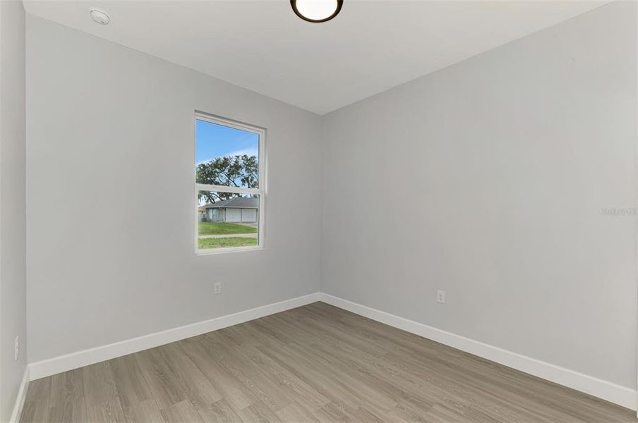 Spacious, unfurnished interior of a new home in , Port Charlotte (Image 28).