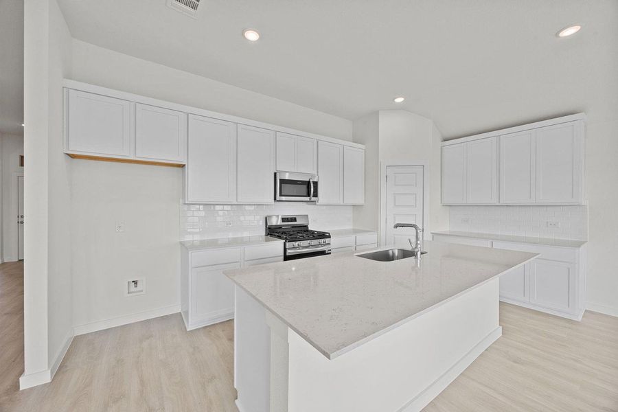 Furnished interior view inside a new home in Prairie Winds, Hutto (Image 8).