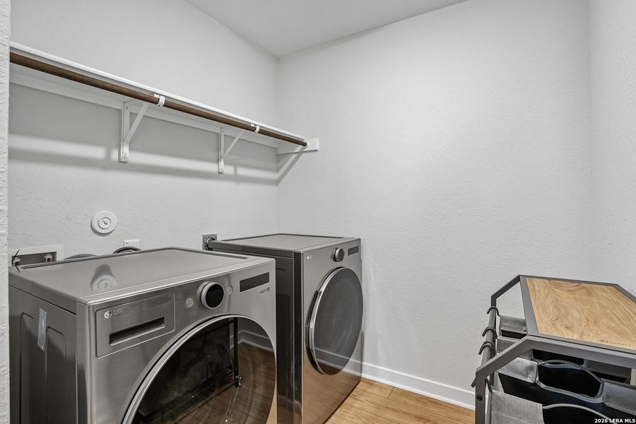 Furnished interior view inside a new home in University Village, San Antonio (Image 13).