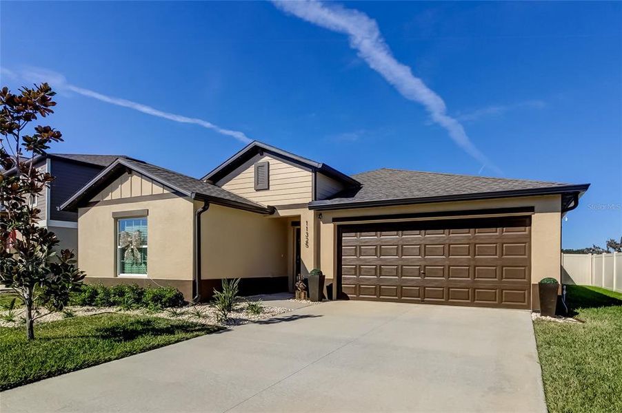 Front exterior of a new home in Mirada: The Estates II, San Antonio, FL, highlighting curb appeal (Image 1). Front exterior of a new home in Mirada: The Estates II, San Antonio, FL, highlighting curb appeal (Image 1).