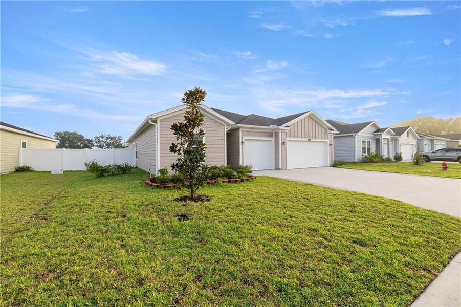 Front exterior of a new home in , Ocala, FL, highlighting curb appeal (Image 15).