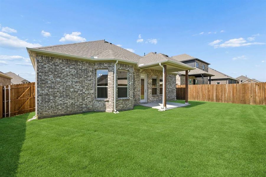 Exterior details and patio area of a home in Country Lakes, Denton (Image 3). Exterior details and patio area of a home in Country Lakes, Denton (Image 3).