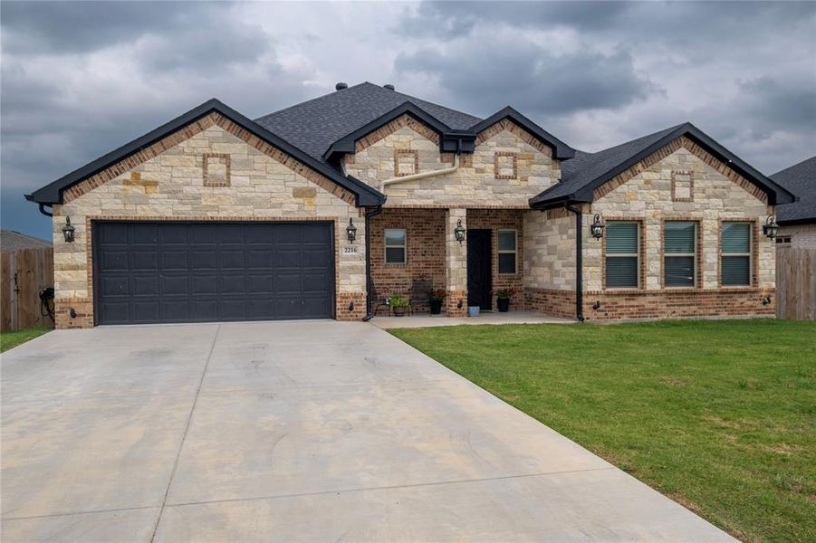 Front exterior of a new home in , Mabank, TX, highlighting curb appeal (Image 20).